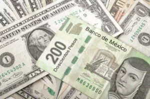 peso mexicano cae 18.46 por dólar